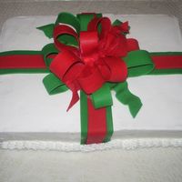 Christmas Gift I made this for my mother-in-law's birthday. It was my first time making a fondant bow and using fondant.