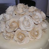 Homemade Gumpaste Roses on my nightmare wedding cake. first try doing roses