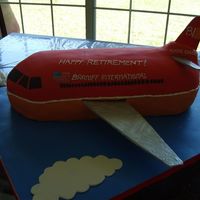 Retirement From Airlines Cake Made from homemade fondant that had some tearing. 2- 13x9 cakes cut lengthwise and stacked w/ pastillage wings