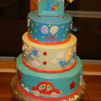Boy's 1St Birthday Cake 3 tier cake for nephew's 1st birthday. Planes, trains, automobiles theme. Cake is 6", 8" and 10". Covered in...