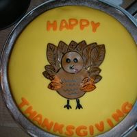 Thanksgiving Turkey Cake Wilton class 4 sample cake turned into a Thanksgiving turkey cake. Fondant with some gumpaste mix, edible markers and luster dust