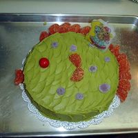 A Fishy Birthday This was the first cake I had EVER made. It was for my daughter's first birthday. It turned out cute, but the frosting was a bad...
