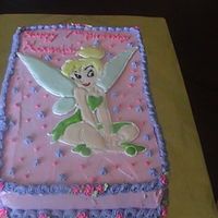 Tink this was a tinkerbell cake for a friend of a friend's daughter's birthday.... the little girl loves tinkerbell. I made Tink out...