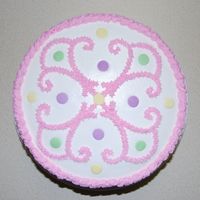 Picture_2373.jpg 2 layer 8" round pan, buttercream, Wilton giant sprinkles, Wilton cake scroll cake presses