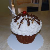 Hot Fudge Sundae Wilton giant cupcake pan, buttercream, melted chocolate chips, nuts, red gumball
