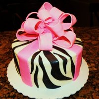 Pink Zebra Stripe Fondant bow and zebra stripes over buttercream