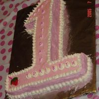 "1" Cake I made this cake for my daughter's first birthday. My first cake ever. I cut the pieces from rectangle shaped sheet cake.