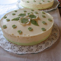 Wedding Cakes Cheese wedding cakes. Mint, white chocolate and caramel.Top: Marzipan flowers and leafs.