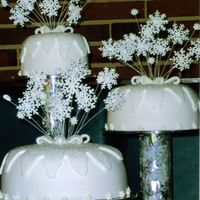 Lastscan.jpg For a beautiful winter wedding...hand made royal icing snowflakes, cake covered in rolled fondant with rolled fondant icicle overlay with...