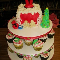 Santa Stuck Again? He did it again. Thanks to CakesbyLJ for the inspiration. All in buttercream and MMF. The Christmas tree was bc on an ice cream cone. For...
