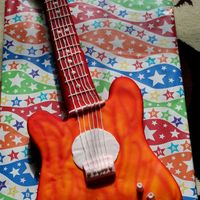 Guitar Rock My First ever guitar. And my first try with the air brushing. Any suggestions with the work.