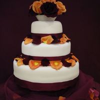 Orange And Purple The top two tiers were lemon with strawberry filling, the bottom was white with raspberry filling.