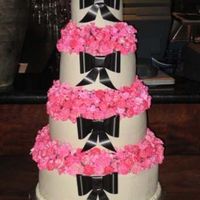 Multi Flower Wedding Cake There were 862 individual airbrushed flowers on this cake between the 4 seperated tiers. Bows were done with florist ribbon and I used a...