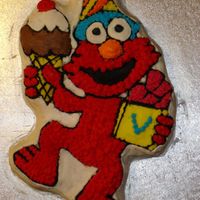 Elmo Cake The catalyst that drove me to classes. This Elmo looked like he was possessed by dark forces. It's just BAD BAD BAD. The kids at my...