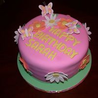 Sarah's 4Th Birthday Cake For my 4 yr old DD who wanted butterflies, flowers, and pink. 8" strawberry WASC w/marshmallow filling. Fondant covered; all details...