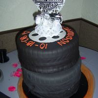 Harley Wedding Cake This was for my former bosse's wedding. Three 12" round tiers stacked off center - they started out more off center but the...