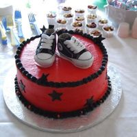Converse.jpg The shoes are real. I couldn't do the gumpaste ones to save my life. :(