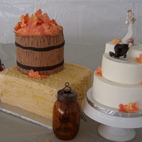 Fall Wedding Fall themed wedding with a hay bail and a barrel of gumpaste leaves