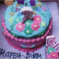 My Cake done in BB. pineapple filling, flowers done in royal icing....happy looking!