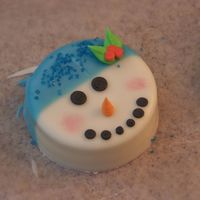 Snowman Oreo's Here is my rendition of the famous oreos that have been going around. They were a GREAT hit!