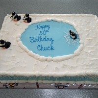 Penguins On Ice Penguins are molded from fondant... one of them has fallen through the ice!