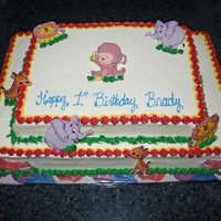 Jungle First Birthday The animals are edible images coated with white chocolate so they will stand.