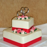 Square With Ribbon Just a little tiered square cake with ribbon.