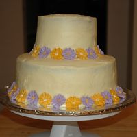 Amy's Bridal Shower Cake I made this cake for my friend's church bridal shower. The bottom layer is chocolate and the top layer is yellow, iced with...