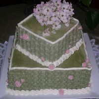 Wedding Shower Cake Cake made for cousins wedding shower. Swedish Almond Butter Cake for both tiers with IMBC icing and fresh picked flowers for topper. The...