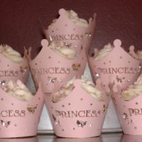 Princess Cupcakes Simple yellow cupcakes with buttercream frosting and sprinkles. I baked them in silver foil cups to really make the pink wraps pop. I found...