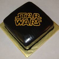 Star Wars My niece wanted a black cake with the "old school" Star Wars logo on it. (LOVE those easy cakes...) Spice cake with cream cheese...