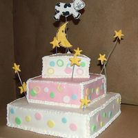 Cow Jumping Over The Moon This is a baby shower cake made of fondant. The extra pieces are made of royal icing set on wire. The cake is cherry chip with a...