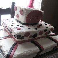 1St Birthday Whimsy Girl 1st Birthday Whimsy Girl cake covered in fondant with a chocolate layer and a lemon layer both with an almond buttercream filling.