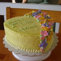 Hannah's Cake 1 Buttercream with royal icing flowers. My first real completed cake (other than Wilton Class cakes) for my daughters 1st birthday. My...
