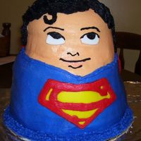 Superman Super Hero Cake This cake is a spin off of a bride cake in the 3D section. I used a 6" 8" and 9" pan to make him. In retorspect I would have...
