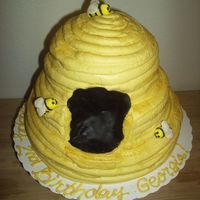 Bee Hive I made this beehive cake for my niece's Winnie the Pooh party. It's buttercream with fondant bumblebees. You can't really...