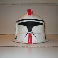 Star Wars Clone Trooper We made this 6 layer cake for my son's 8th B-day. We used 6- 8in layers and carved it into the shape of the helmet and rice crispy...