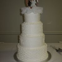 Traditional Cake This is the most traditional type wedding cake I have done. It was vanilla cake with buttercream filling and buttercream icing.