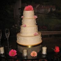 Fluer's Cake This is a vanilla cake with vanilla filling and buttercream icing. I actually dropped the 3rd teir about 2 hours before the wedding and had...