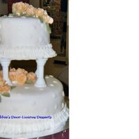 Wilton 3 Final Orange Roses Well I finally got around to uploading this. I gave this cake to a friend, who was taking it to her friend's Rehearsal Dinner. Well,...