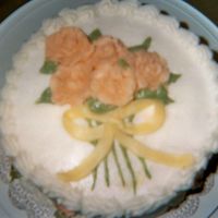 Wilton 1 Flowers And Bow From my Wilton 1 class. I was soooo glad we could use a different color than pink. :-) (I'm also working on my photography skills...