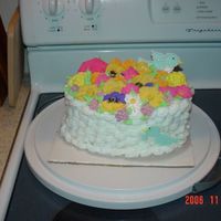 Wilton Course 2 Cake This was my final cake for the Wilton course 2. I know there are alot of flowers on it but I figured if I made them I was gonna display...