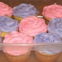 Baby Shower Cupcakes A woman I used to work with was having a baby shower, so I decided to make vanilla cupcakes with rosette swirls. Not too shabby for an...