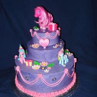 My Little Pony This is one of the first cakes I made, about two years ago. I forgot to upload it. Its buttercream with fondant flowers.