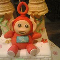Teletubies Made this out of modelling paste(50/50). The little girl wanted teletubies on her cake.