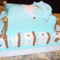 Boy Baby Shower Cake Done for a boy's baby shower. The top cake was supposed to look like a prince's pillow, but instead came out like a bed. She...