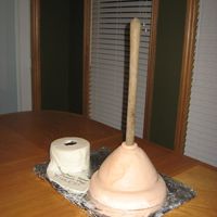 Plunger For Dh's 35Th Birthday Thanks to all you creative bakers on CC who posted pictures of plunger cakes! Especially jscakes for adding the TP, it was the perfect...