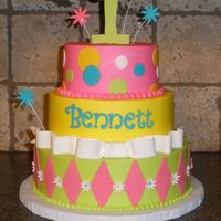 Whimsy Daisys And Diamonds 6, 8 and 10" rounds, iced in buttercream with fondant accents.