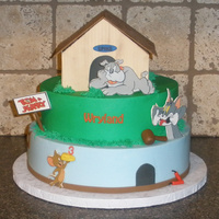 Tom & Jerry 6" roun inside of Spike's dog house, 10" and 12" rounds. The dog house is made from fondant panels. The characters are...