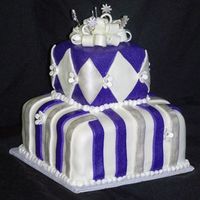 Fun Graduation Cake I made this purple and white and silver fun tiered fondant cake for a graduation cake. I sprayed it with my airbrush and pearl dust. I...